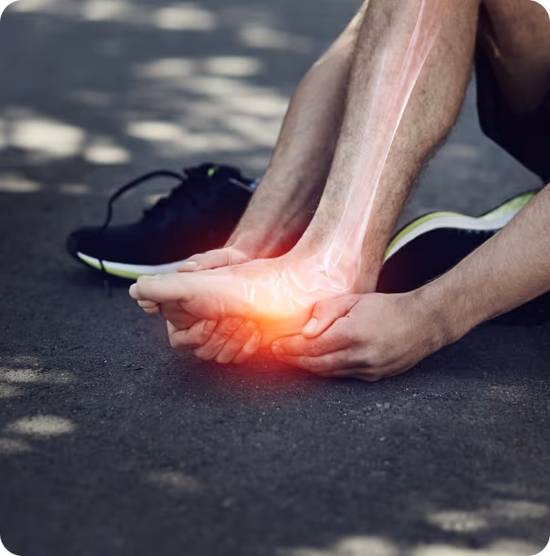 a person holding his foot