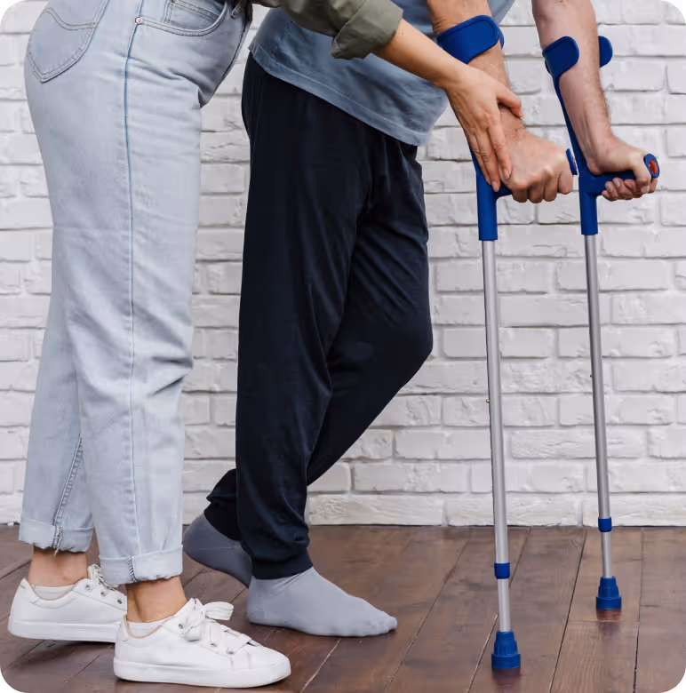 a person and other person with crutches