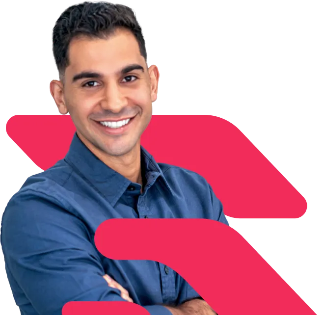 Dr. Jonathan Gonzalez, the founder of RehabSpot Physical Therapy, smiling with his hands crossed.