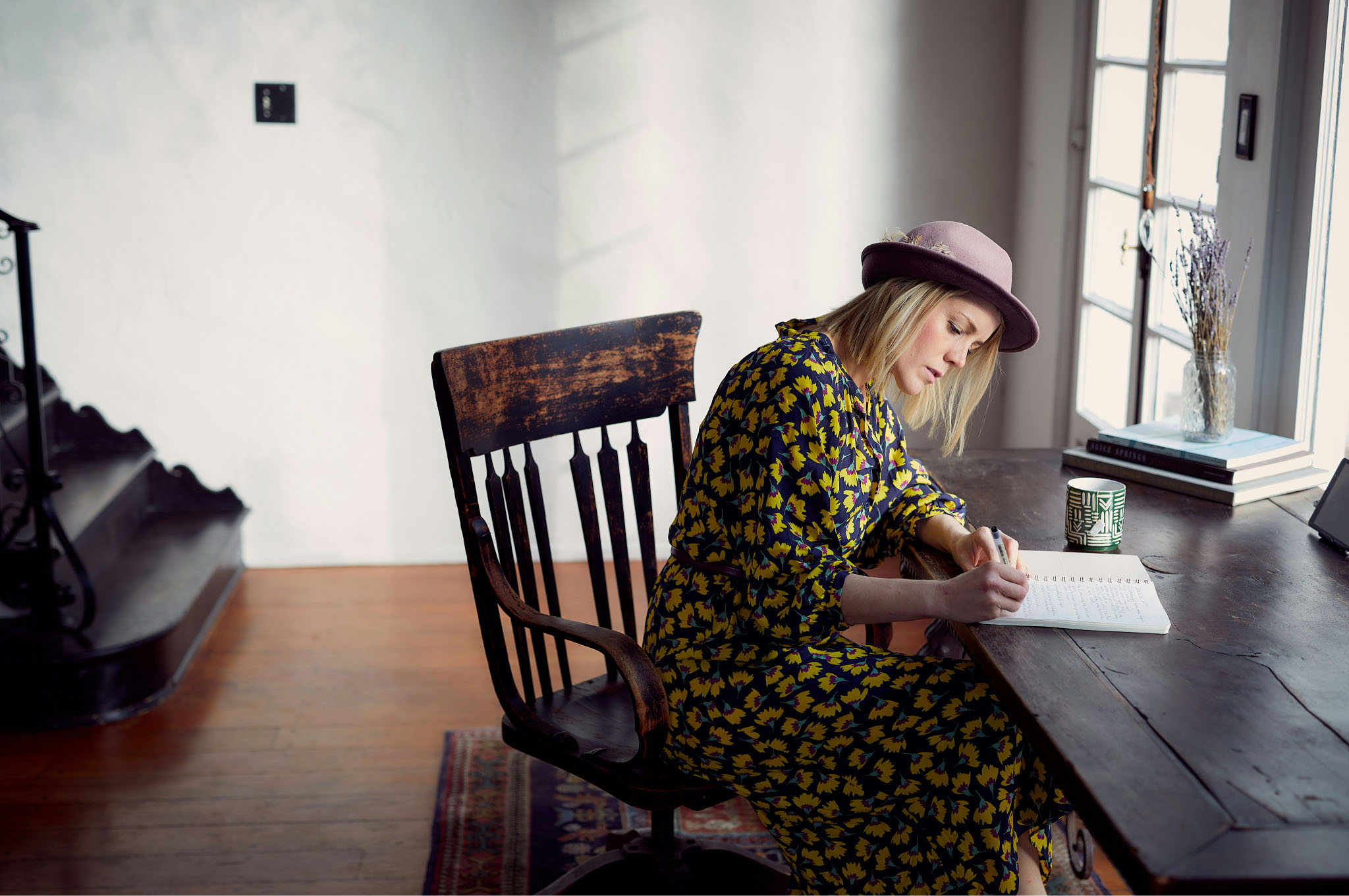 Woman writing in a notebook