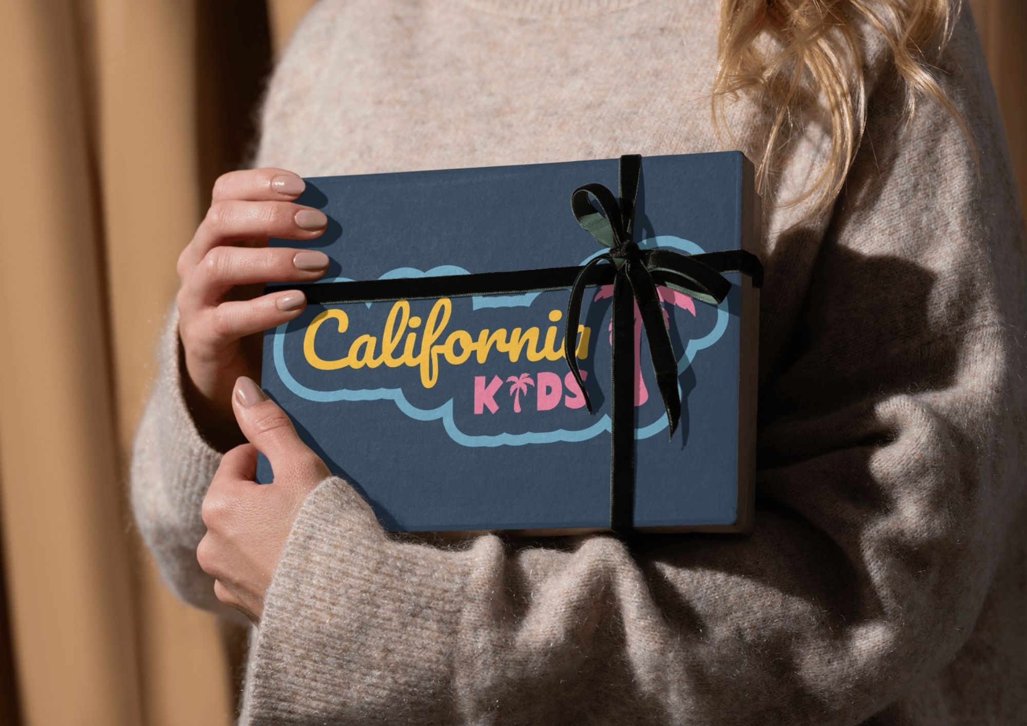Packaging California Kids mettant en scène l’identité visuelle créée par l’agence de branding Bizbold à Liège.