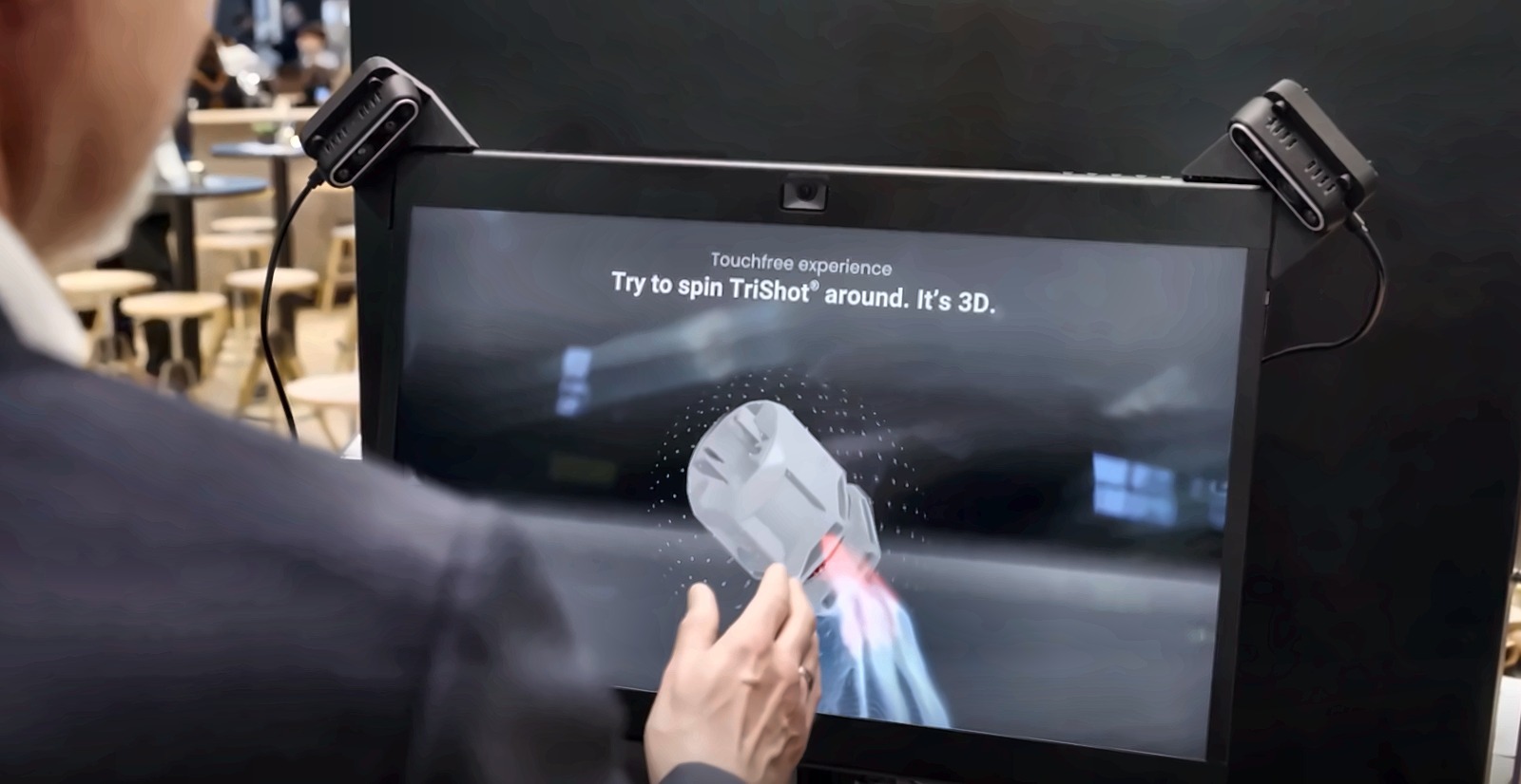 A visitor exploring a WISKA product in touchfree 3D on STARKIT SRD