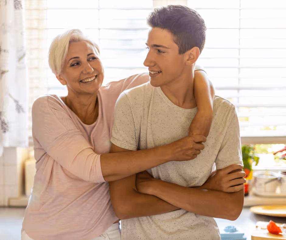 mother hugging adult son - New Haven County will and trust lawyer concept