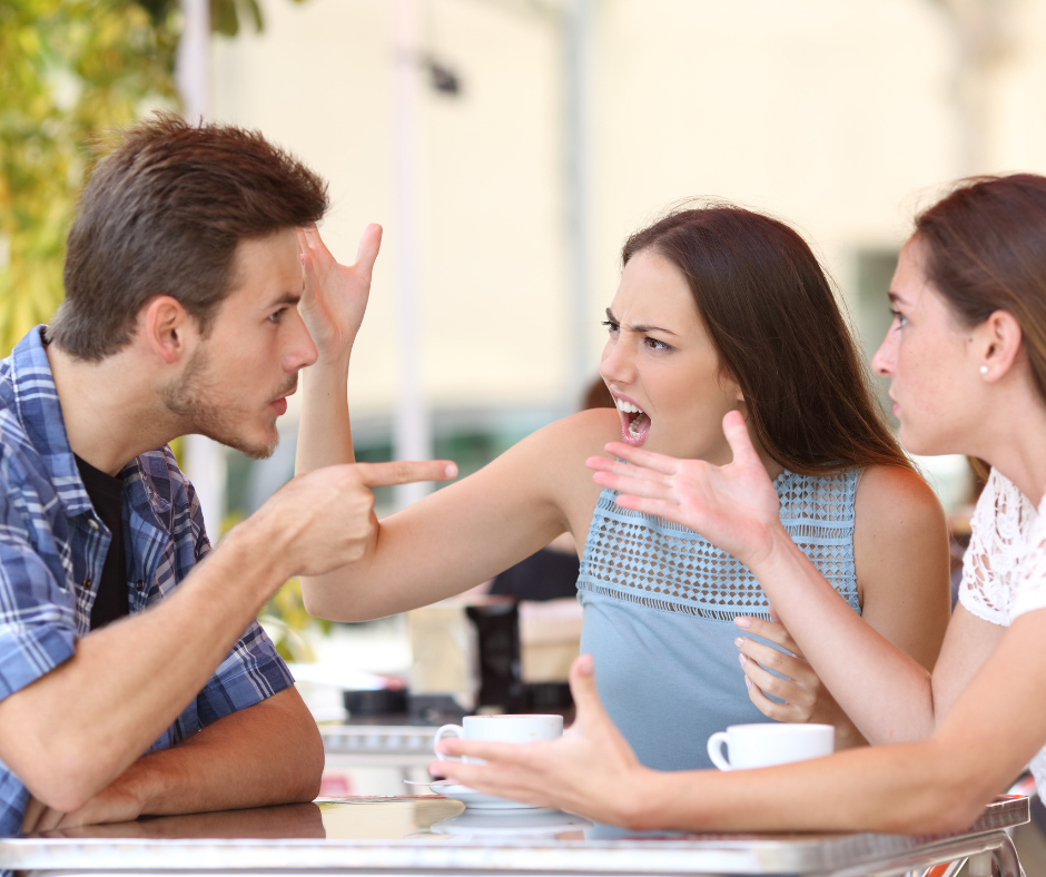 family disagreeing at living room table - elder care in Milford concept