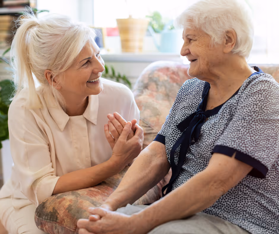 older women talking on couch - Trumbull elder lawyer concept