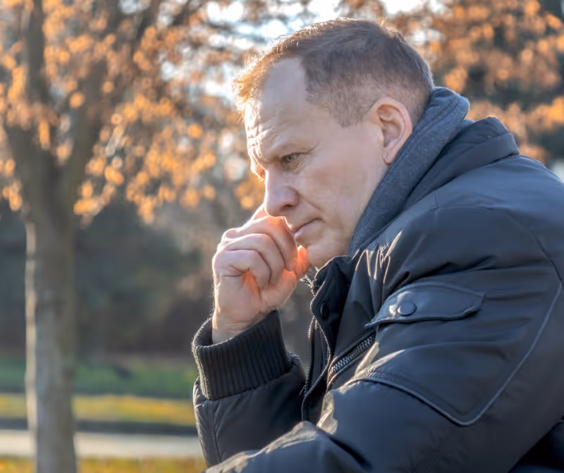 man outside thinking - New Haven County estate lawyers concept