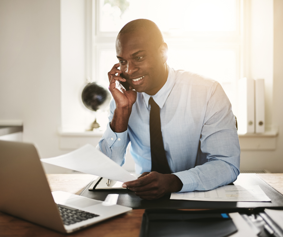 man in tie talking on phone - Milford estate planning attorney concept