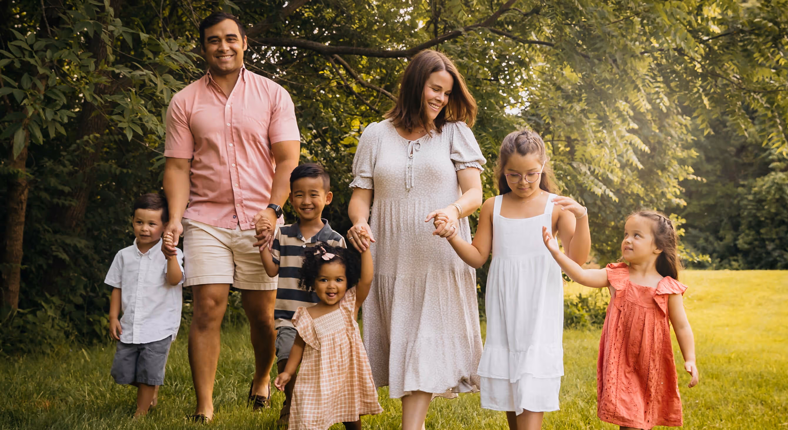 Children joyfully playing with colorful balls in the air.