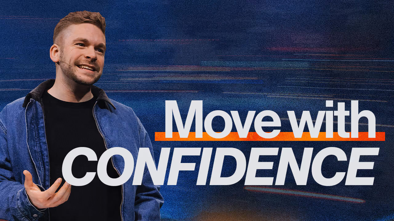 Smiling man in a denim jacket gesturing with hand beside text reading 'Move with CONFIDENCE' on a dark blue background.