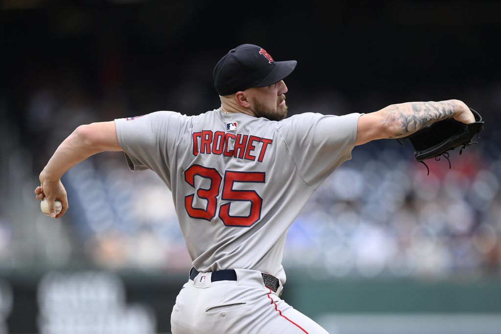 Red Sox P Garrett Crochet pitches during an MLB game. Crochet is a top MLB DFS pick today, Monday, August 11, as he starts in the Red Sox vs. Astros game at 8:10 p.m. ET.