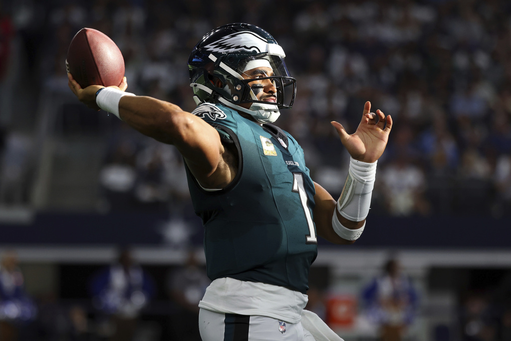 Eagles QB Jalen Hurts is highlighted in the Cowboys vs. Eagles predictions and picks for Thursday Night Football 