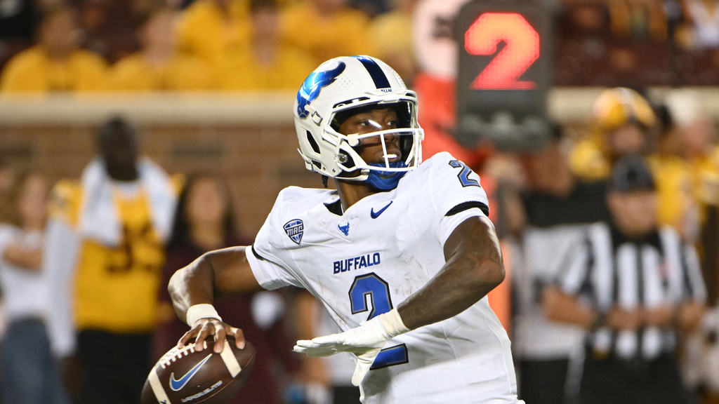 Buffalo Bulls QB Ta'Quan Roberson drops back to pass during a game.