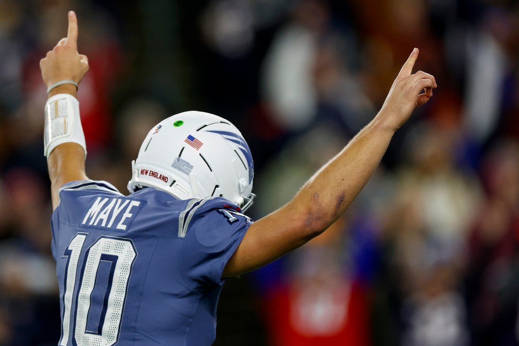 Patriots QB Drake Maye celebrates during an NFL game.