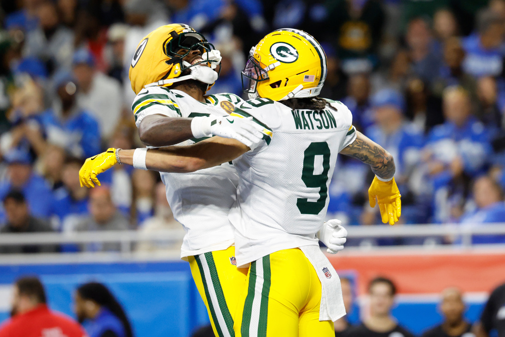 Packers WR Christian Watson celebrates during an NFL game. Christian Watson is a top fantasy football option in start 'em, sit 'em for NFL Week 14.