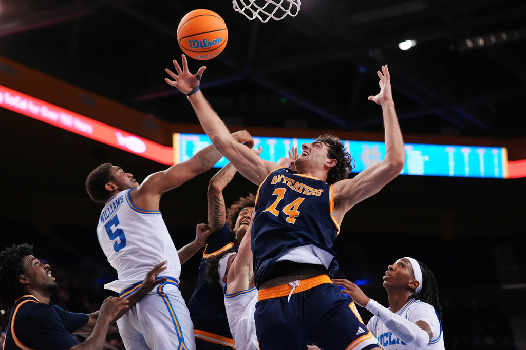 UC Irvine Anteaters F Kyle Evans goes up for the ball near the basket against UCLA.