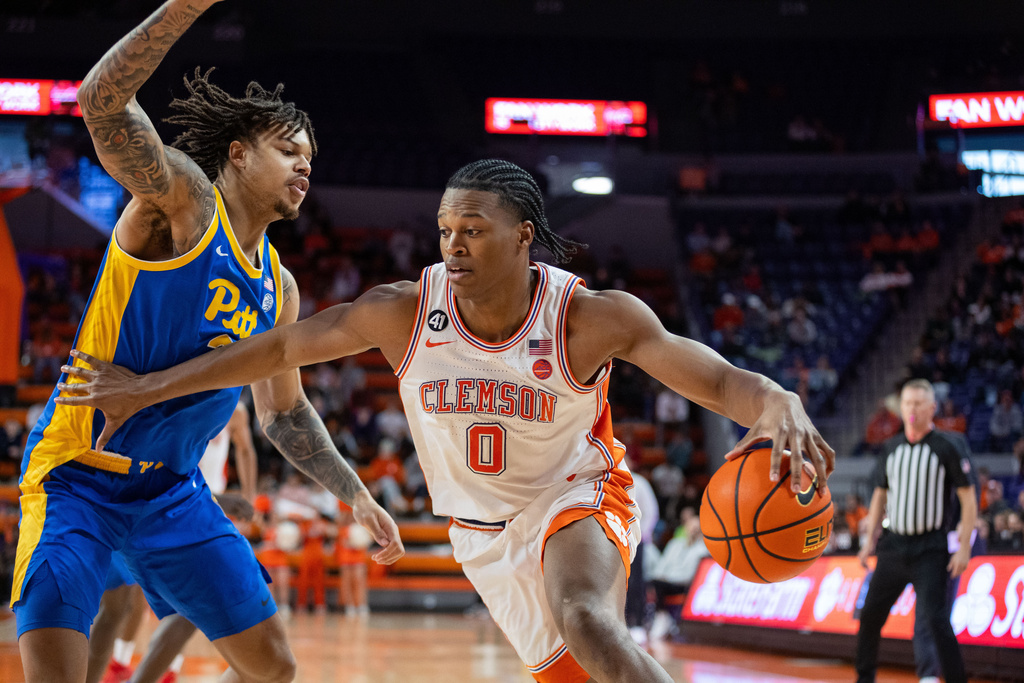 Clemson F RJ Godfrey drives to the basket in a CBB game.