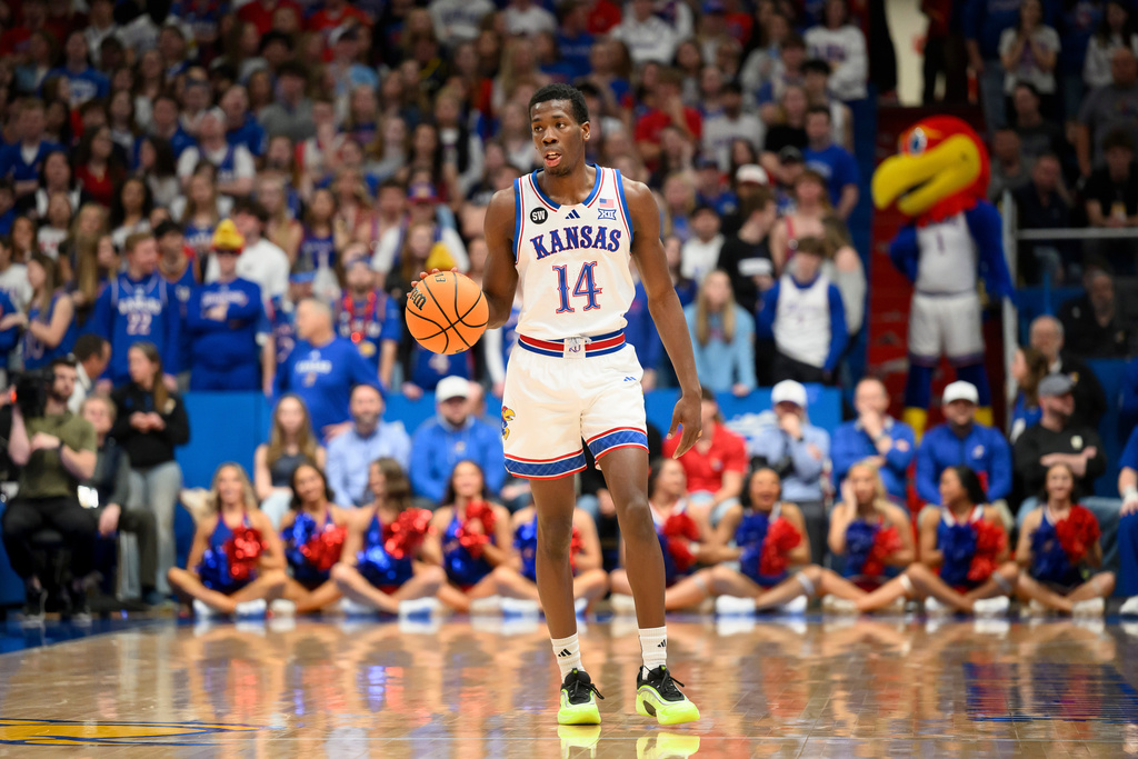 Kansas Jayhawks G Melvin Council Jr. dribbles up the floor in a game against the Utah Utes.
