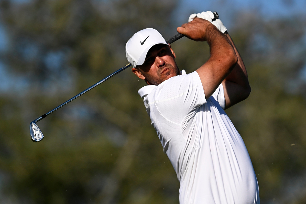 Brooks Koepka tees off during a PGA Tour event.