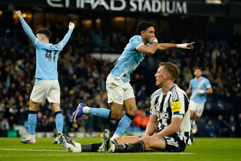 Manchester City's Omar Marmoush celebrates after scoring during a match vs. Newcastle United.