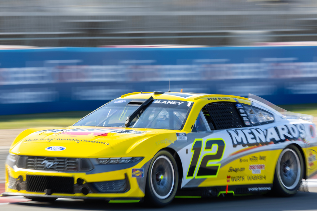 Team Penske's Ryan Blaney drives through Turn 15 during a NASCAR race in Austin, TX.