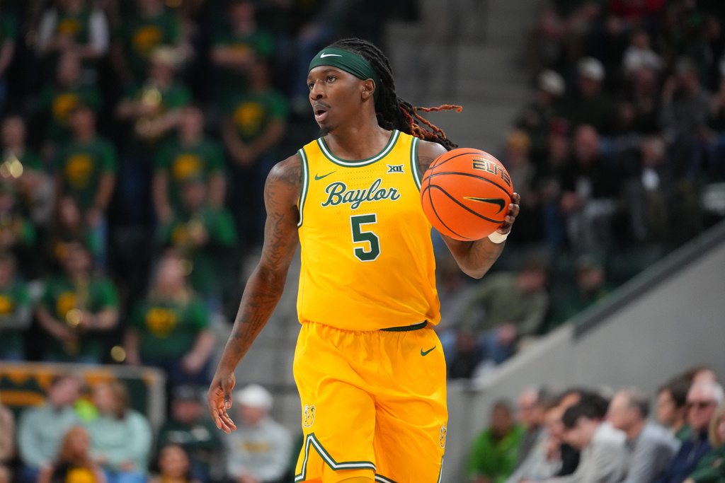 Baylor G Obi Agbim dribbles up court vs. Texas Tech.