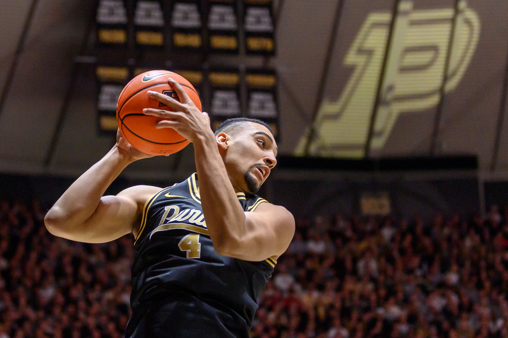 Purdue's Trey Kaufman-Renn grabs a rebound during the first half of an NCAA college basketball game.