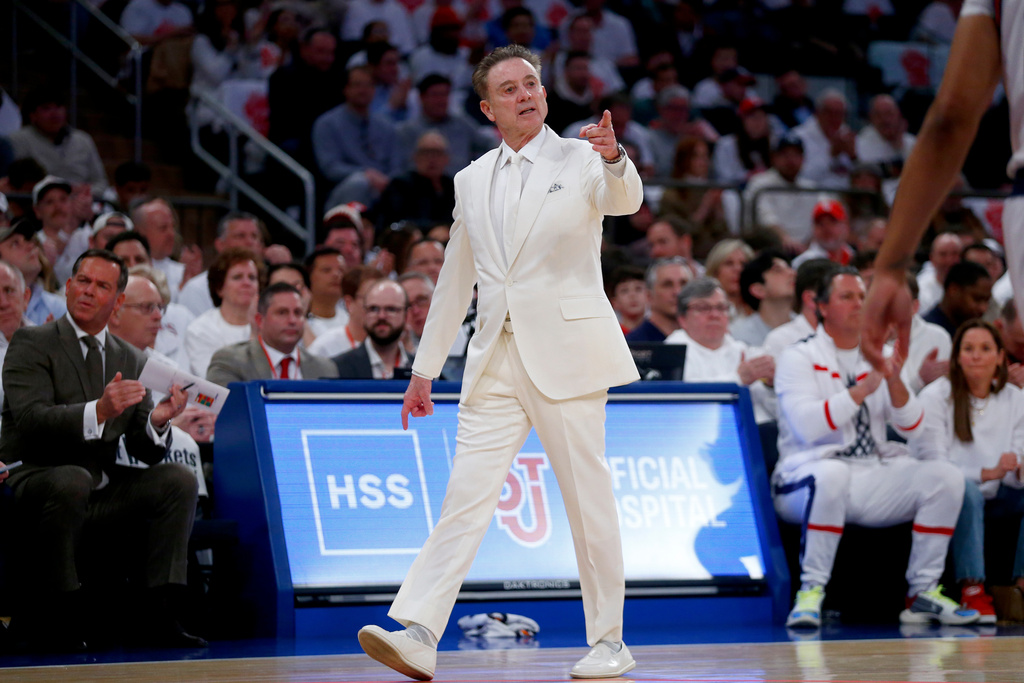 St. John's Red Storm HC Rick Pitino walks the floor during a game against the Villanova Wildcats.