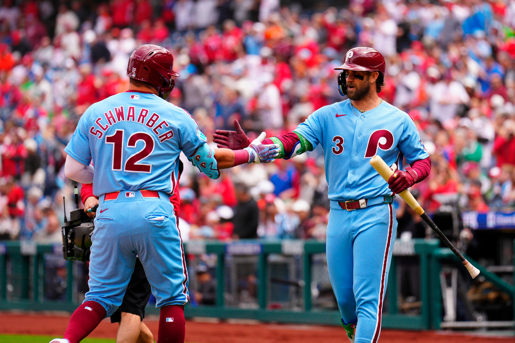 Phillies DH Kyle Schwarber and 1B Bryce Harper celebrate vs. the Giants.