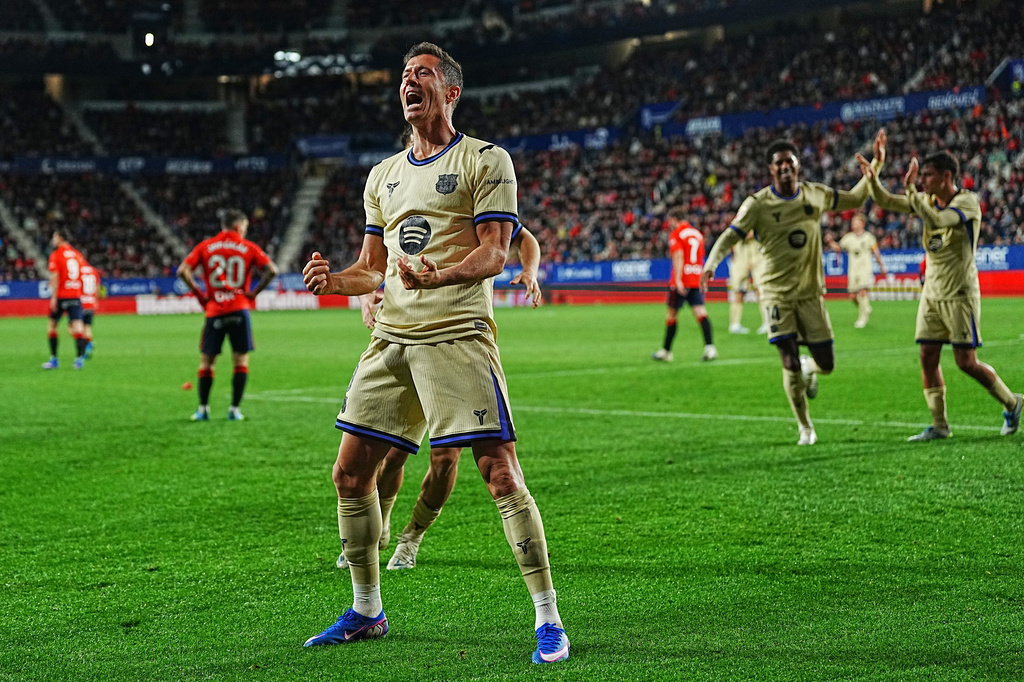 Barcelona's Robert Lewandowski celebrates after scorng vs. Osasuna in a La Liga match.