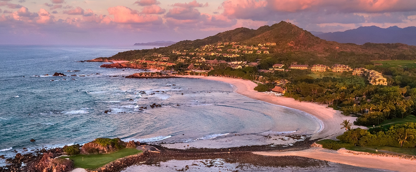 Woman holding surfboard