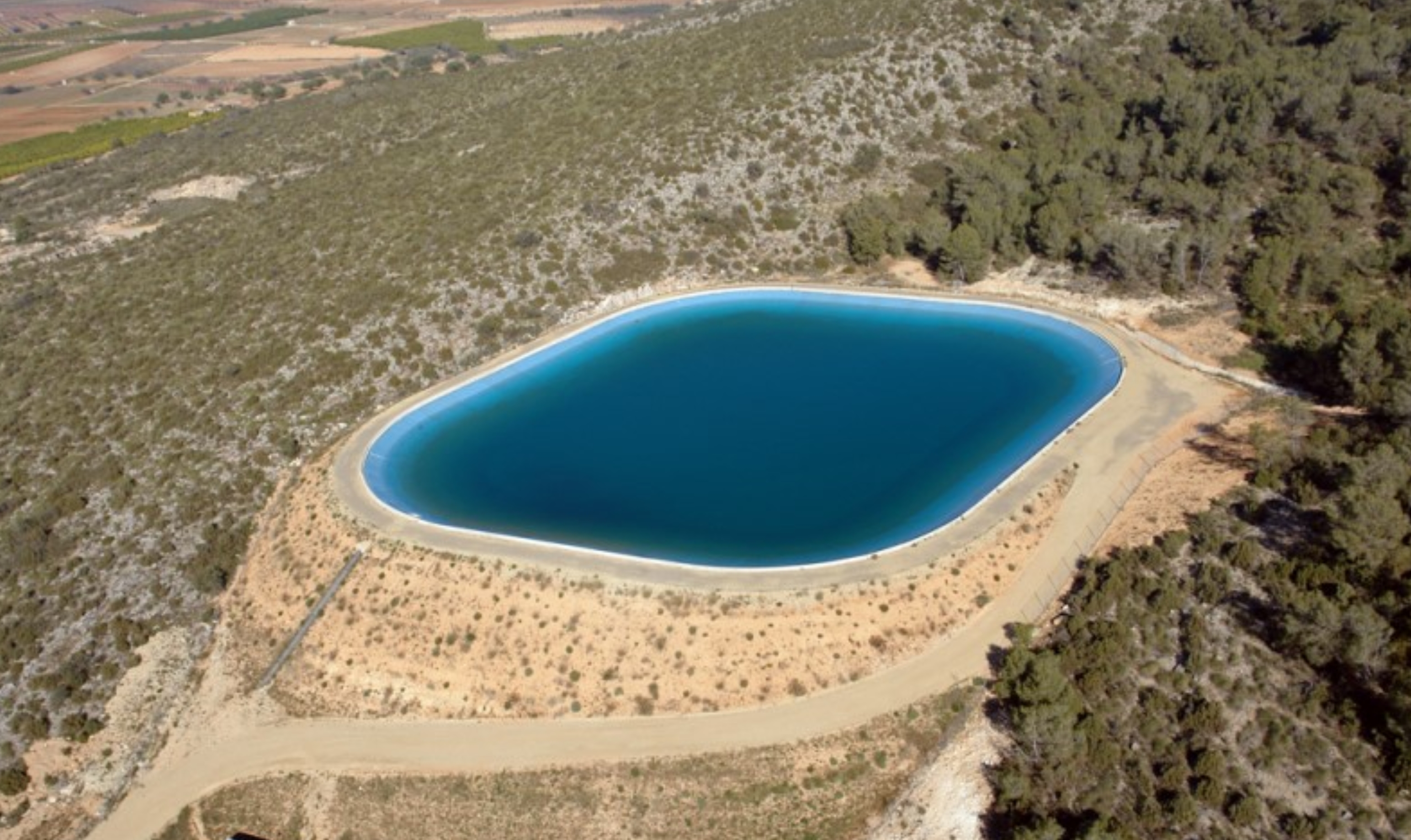 Irrigation Reservoir Evaporation in Spain: How Much Water You Really Lose