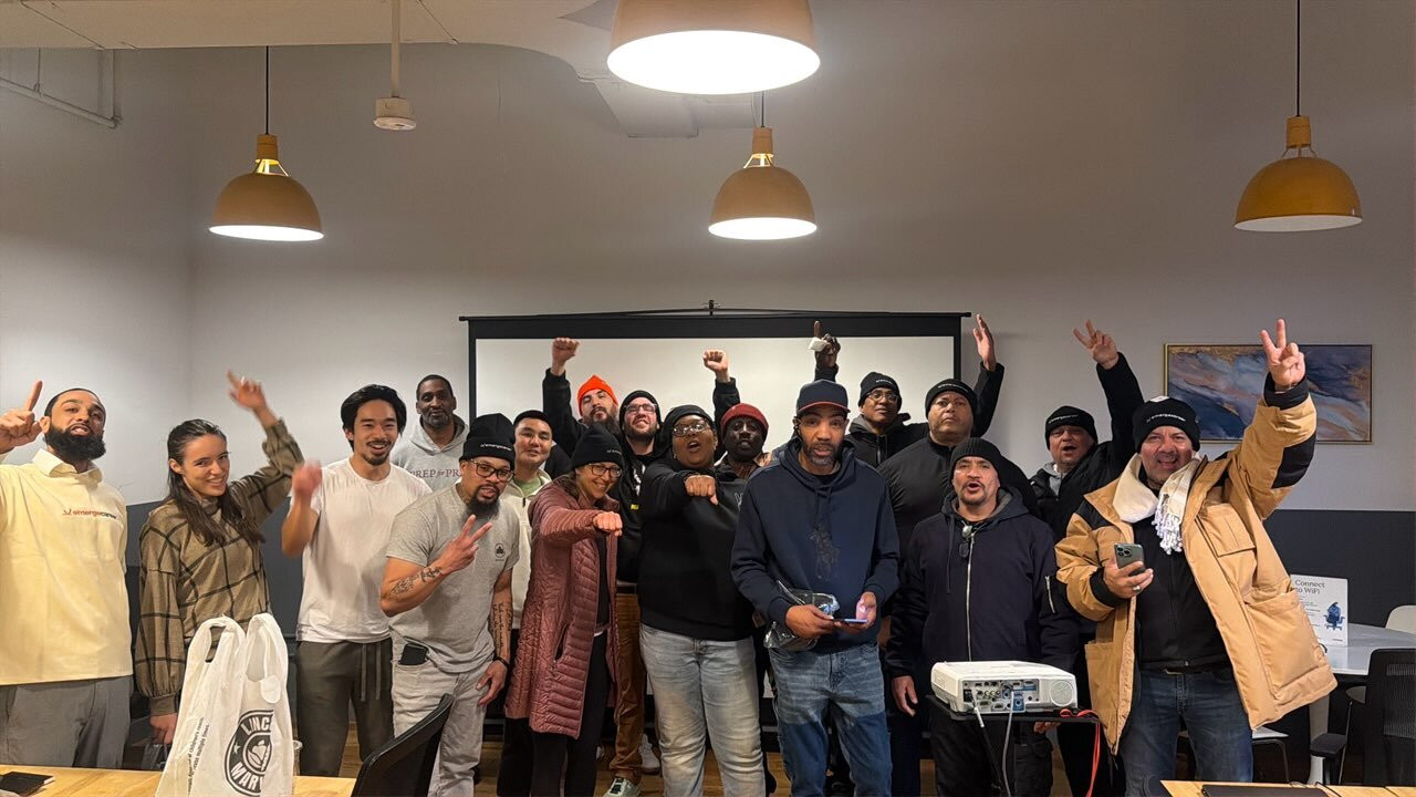 Packed Harlem study hall with participants at tables