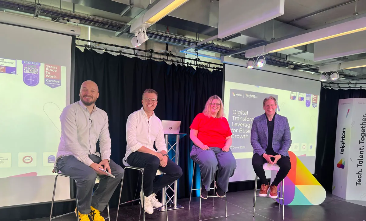 Panel discussion taking place on stage at TechNExt, from L-R Steve Morland, Leighton CTO and moderator, James Eastham Senior Cloud Architect at AWS, Julia Dann Solutions Architect at Immediate Media Co and Mark Joyce CTO at Preventx. 