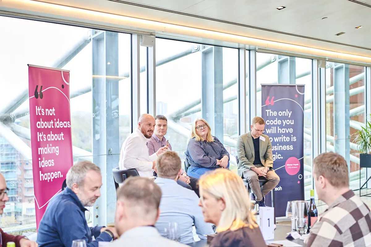 The on:tech panel sat side by side on stage taking questions from the audience.