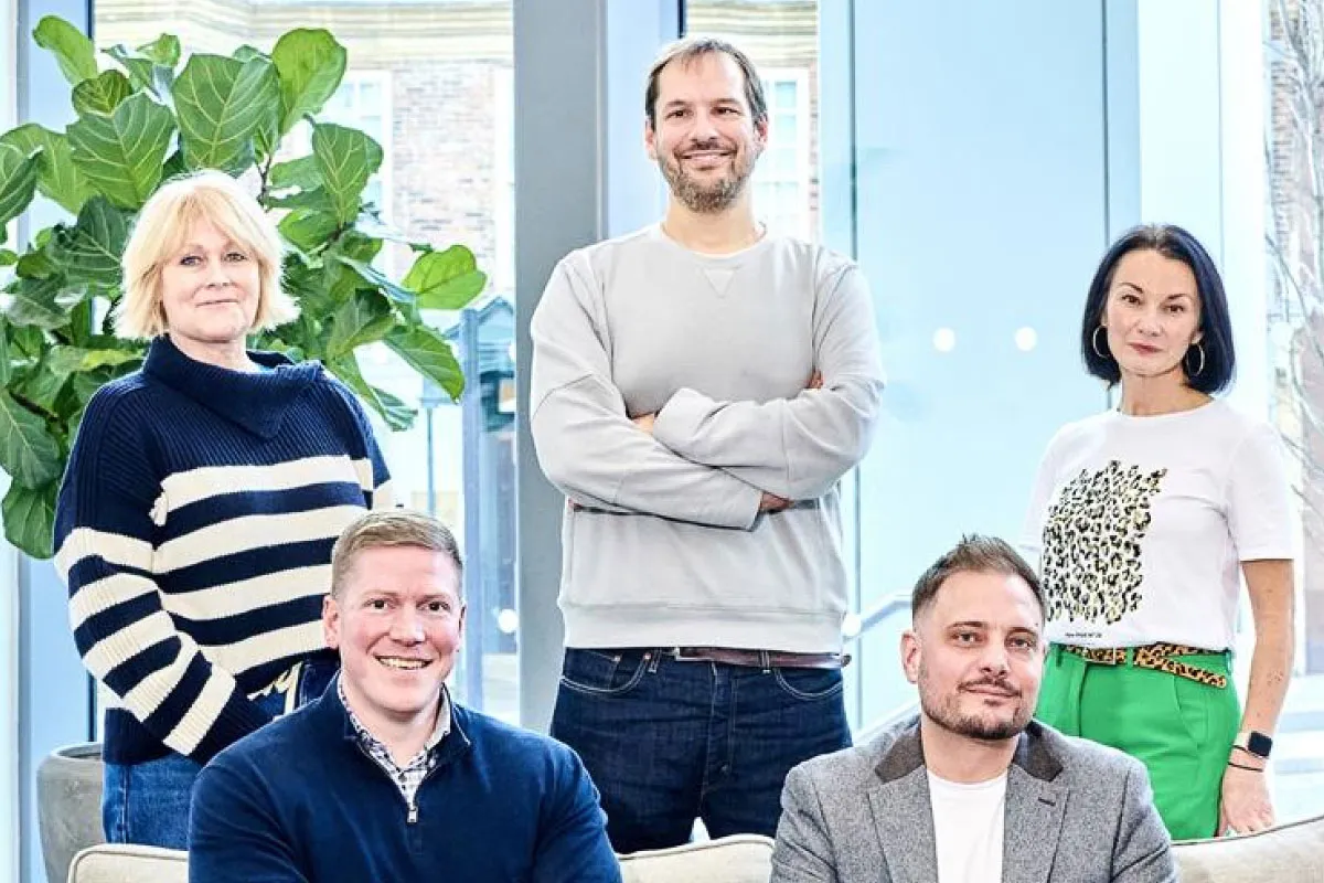 Leighton colleagues posing together: L-R- Claire Gledhill COO, Andy Carr CFO, James Bunting CEO, Lee Gilmore AWS Practice Lead and Claire Cundill CBO.