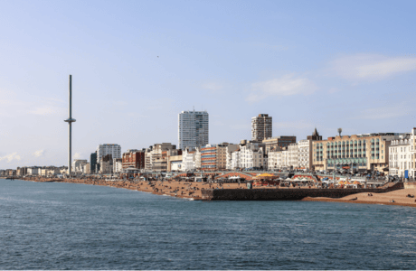 The Brighton shoreline, overlaid with the TestBash logo.