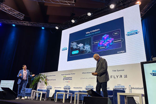 Two speakers on stage during the World Aviation Festival.