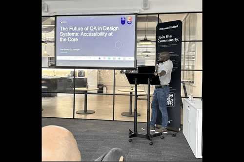 QA Manager, Kennedy Bonsu delivering his a presentation at Trusted Tech Talks in Manchester. 