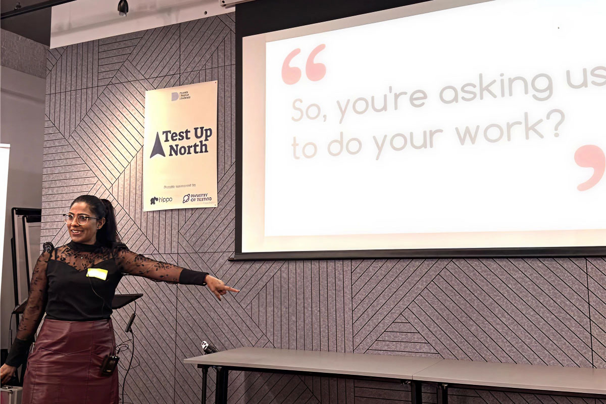 Leighton QA Manager Suman Bala delivering her talk at Test Up North.