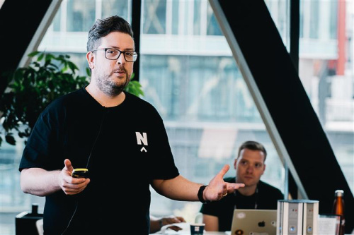 Mark Sailes, stood up delivering a talk. 