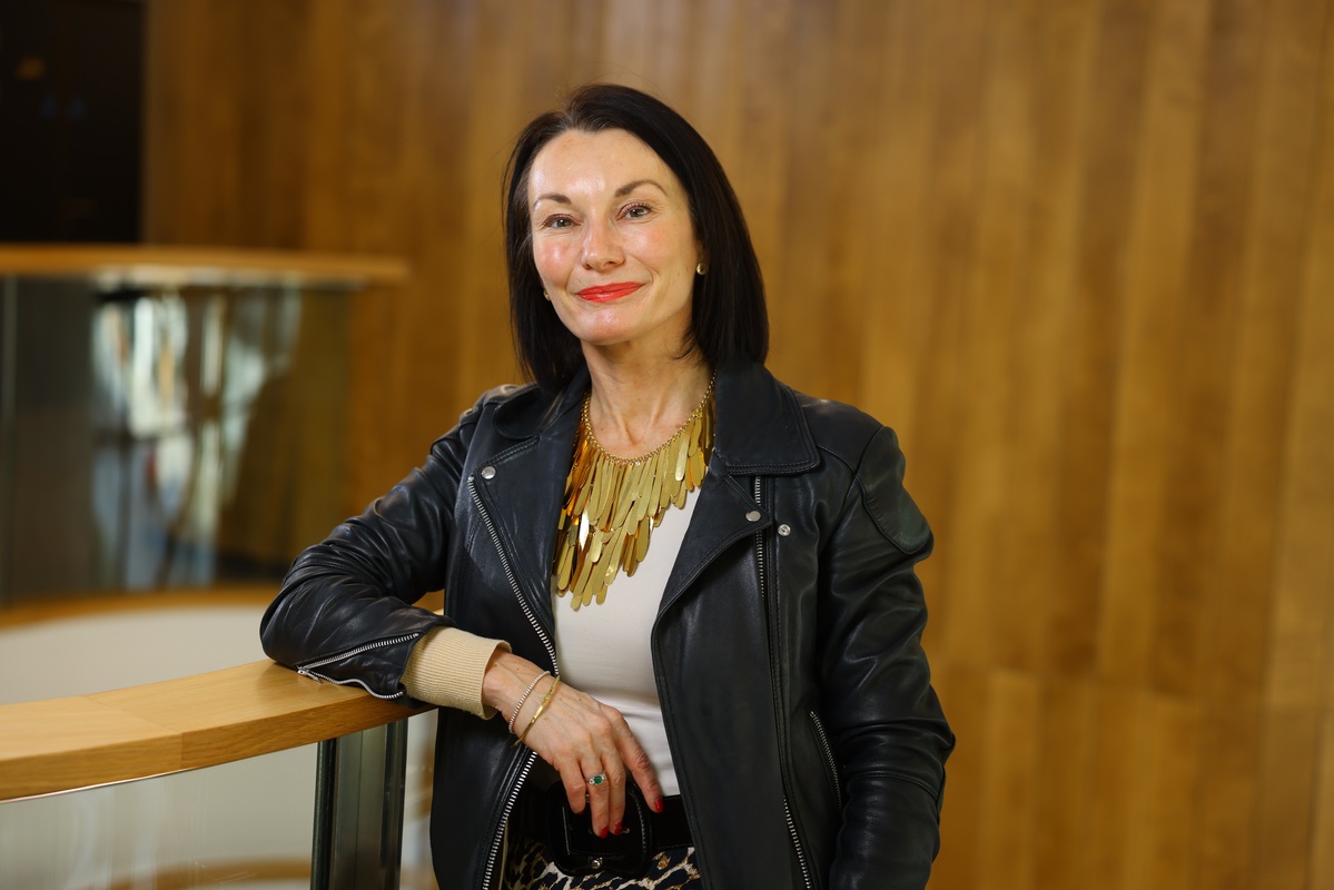 Leighton Chief Revenue Officer, Claire Cundill, stood facing the camera. 