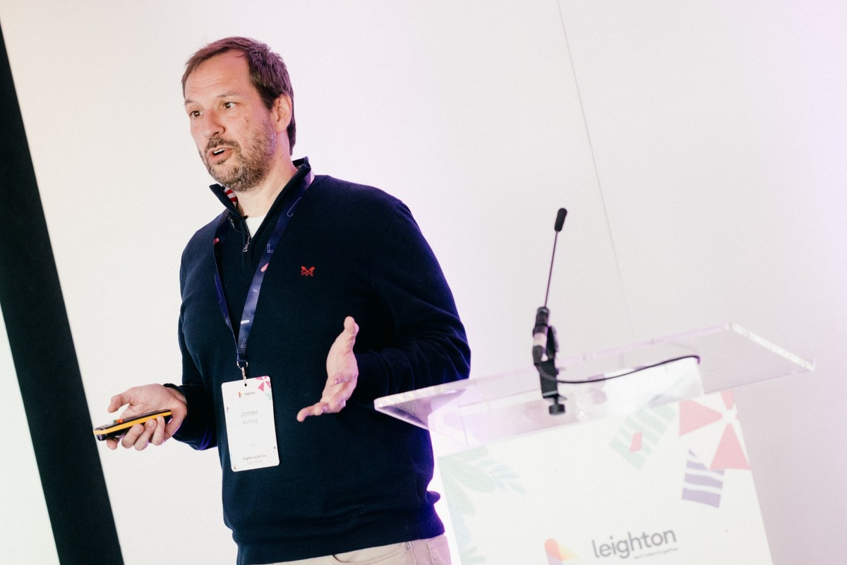 Leighton CEO James Bunting delivering a talk.