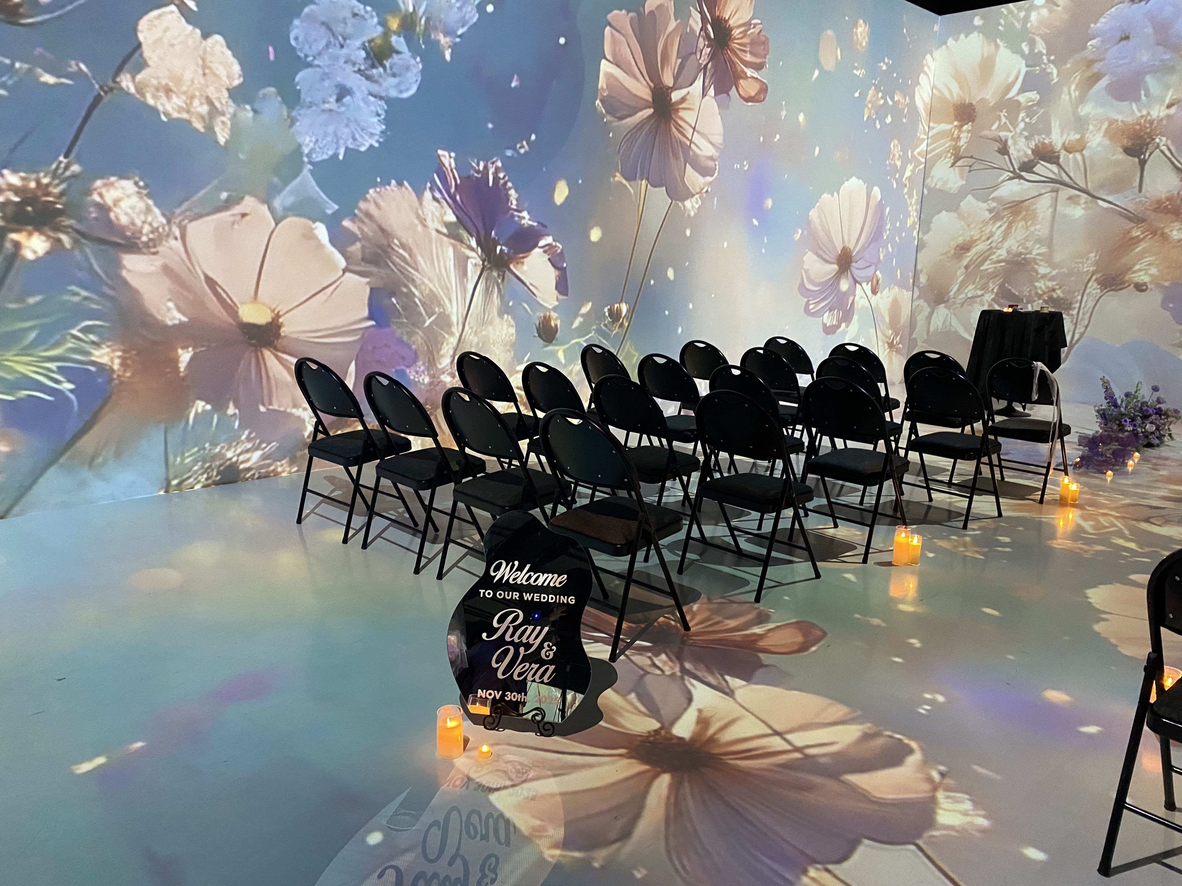 Wedding ceremony with floral projection.