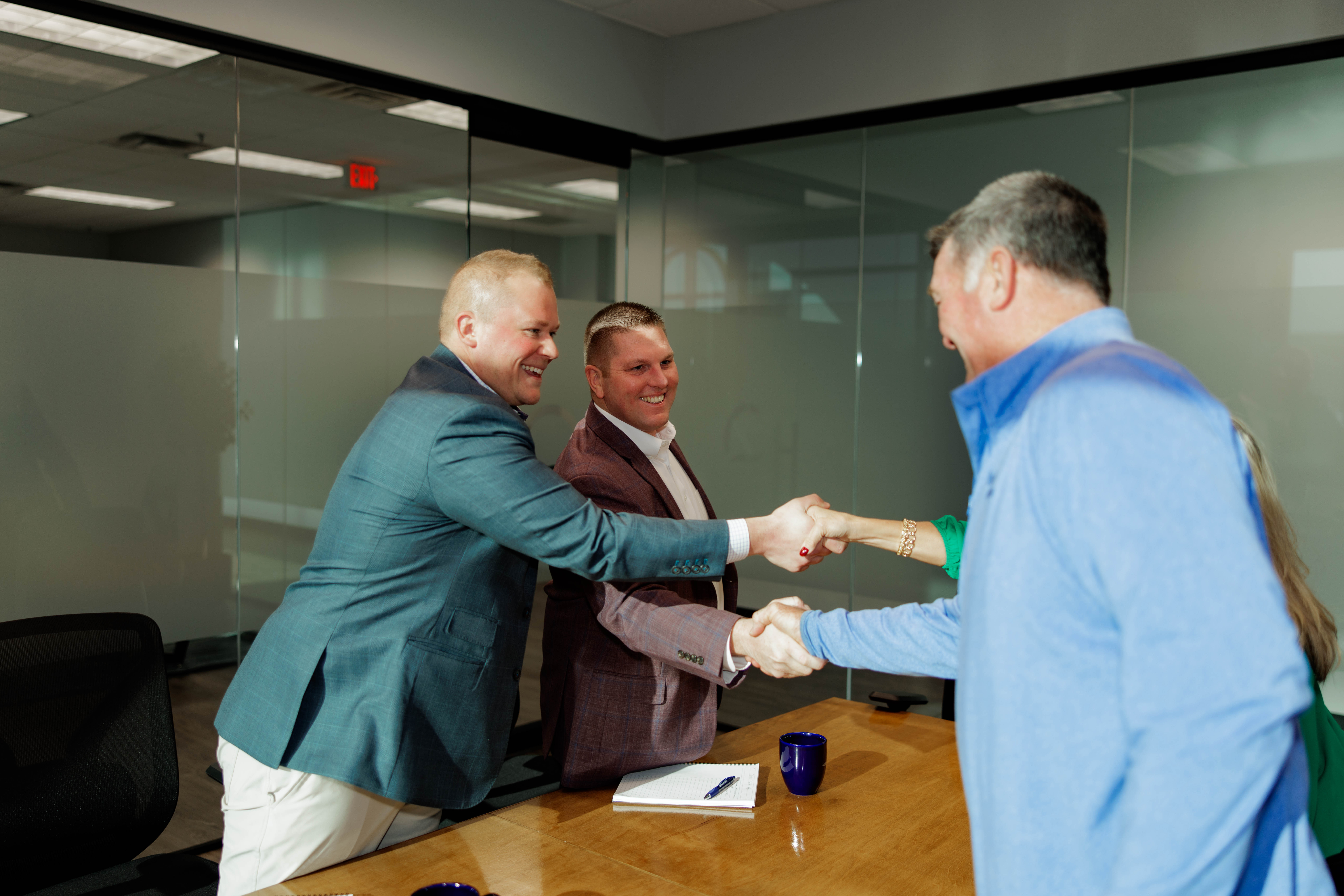 Baby and toddler laying on a bad