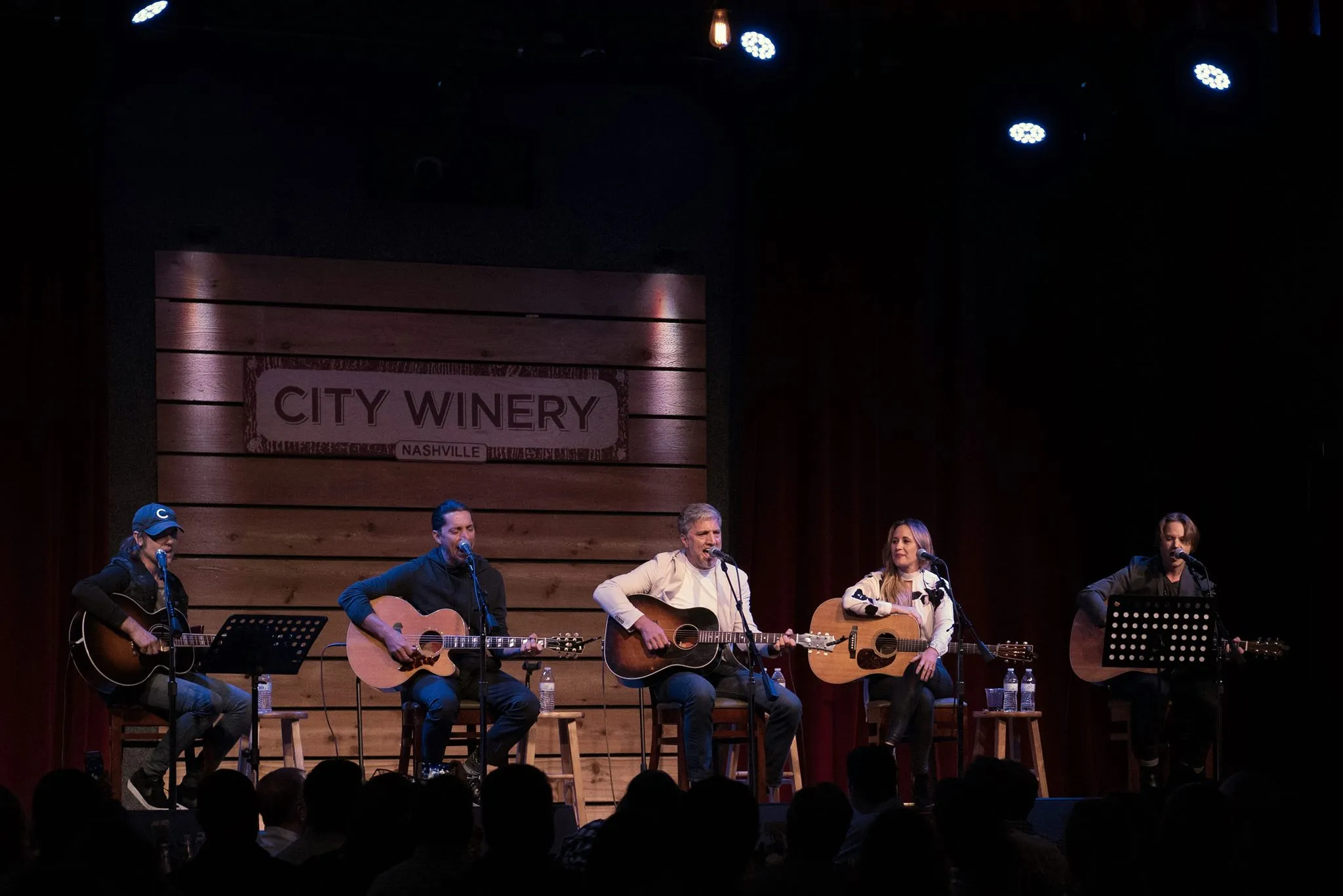 the warren brothers, josh kear, and jessi alexander playing a songwriters round