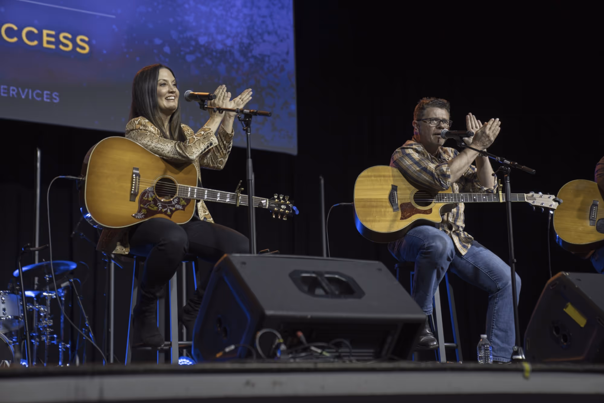 two songwriters performing