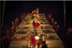 A seated dinner service for a larger gathering.