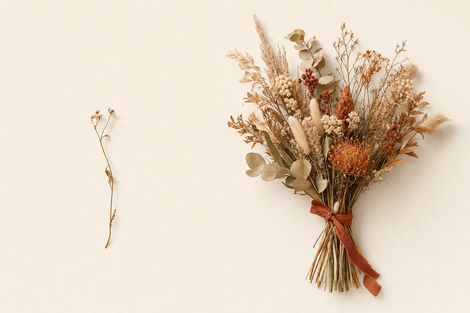 A single wildflower stem beside a full bouquet tied with terracotta ribbon