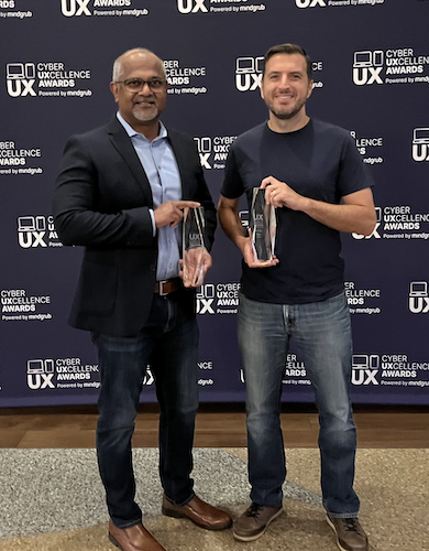 Pixee’s Head of Sales and Success Girish Nair alongside CTO and co-founder Arshan Dabirsiaghi, holding two Cyber UXcellence Awards, standing in front of the awards backdrop.