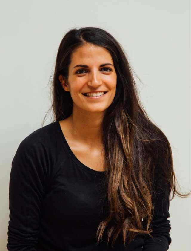 woman wearing black scoop-neck long-sleeved shirt